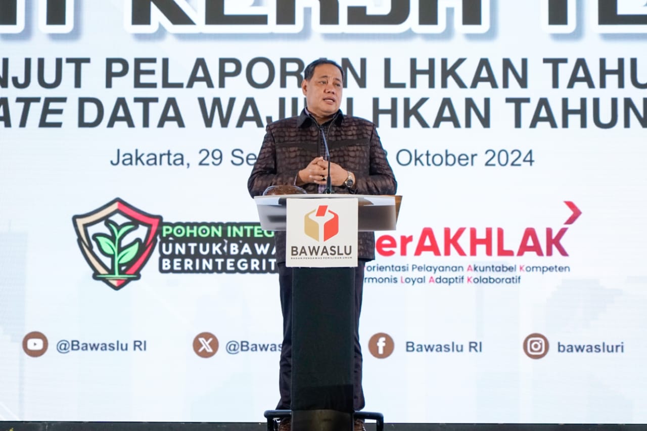 Herwyn J Malonda saat berikan sambutan pada Rakernis Pelaporan LHKAN 2024