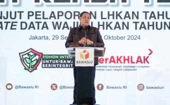 Herwyn J Malonda saat berikan sambutan pada Rakernis Pelaporan LHKAN 2024